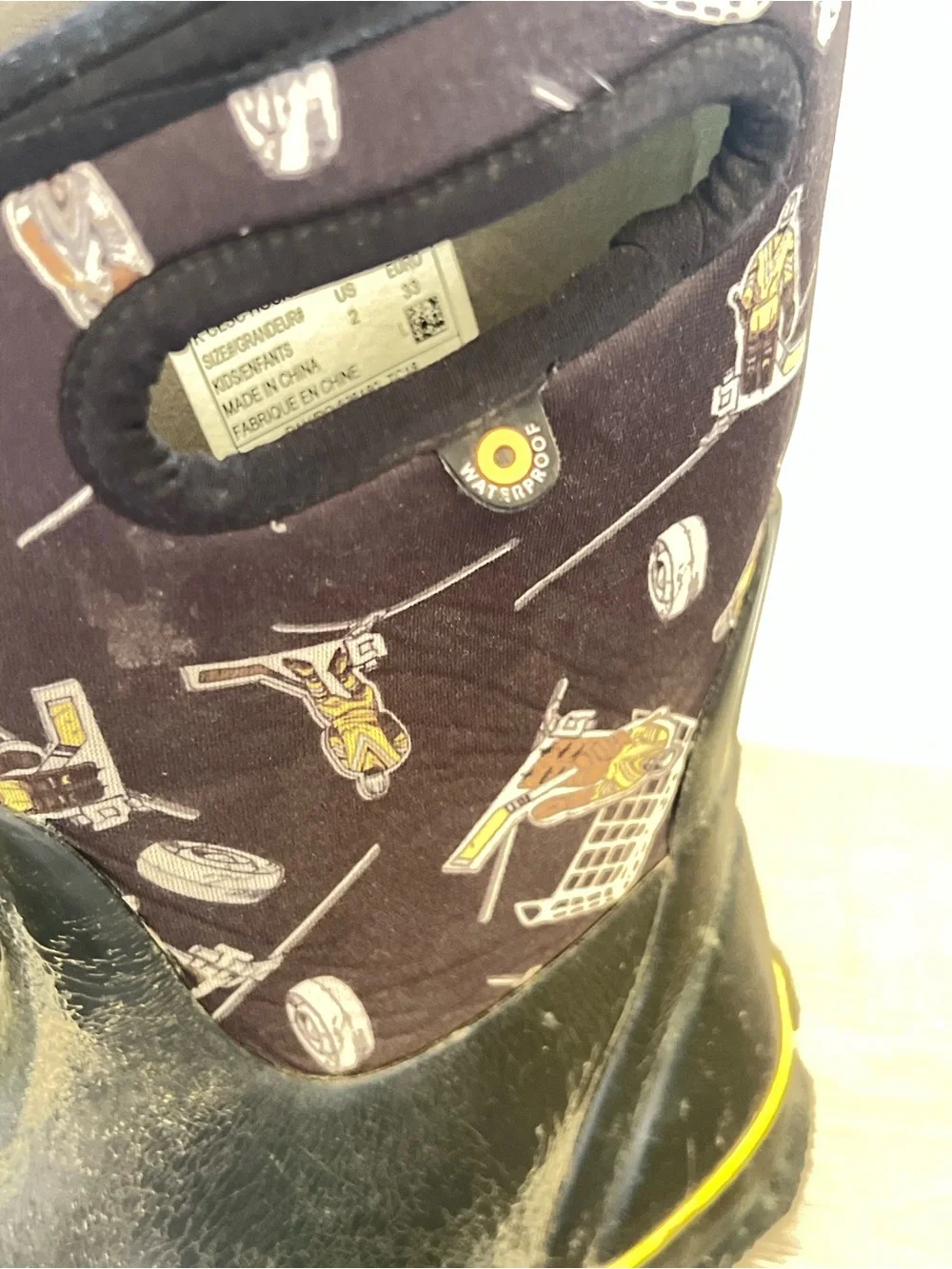 Bogs Black and Yellow Kids Hockey Graphic Rain Boots